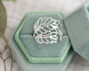 Silver leaf ring in mint velvet box with dried eucalyptus.
